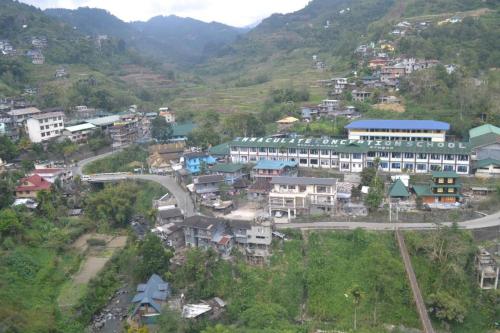 an aerial view of a town in a mountain at BANAUE EVERGREEN HOSTEL AND RESTAURANT in Banaue
