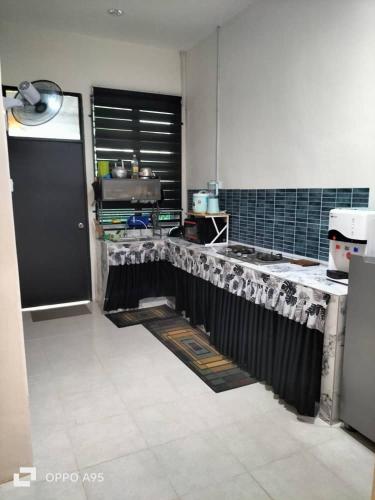 Kuchyň nebo kuchyňský kout v ubytování Amaryu homestay