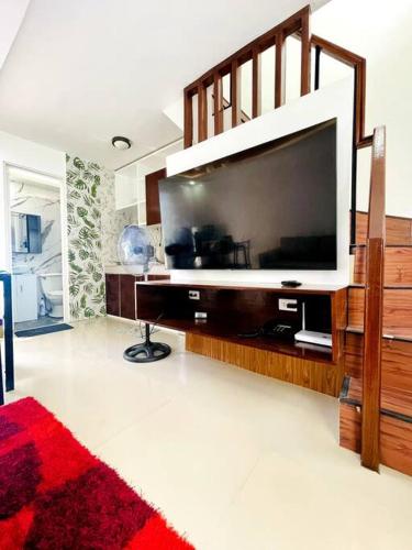 Televízia a/alebo spoločenská miestnosť v ubytovaní Modern House in Butuan City with 2bedrooms in Camella