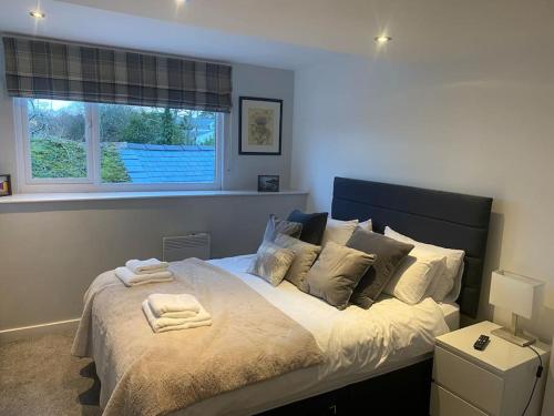 Postel nebo postele na pokoji v ubytování Roselea Cottage