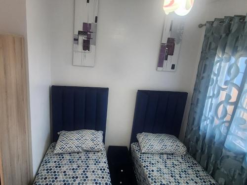 Cama o camas de una habitación en Super appartement vue sur mer et à 2 minutes de la plage de Martil.