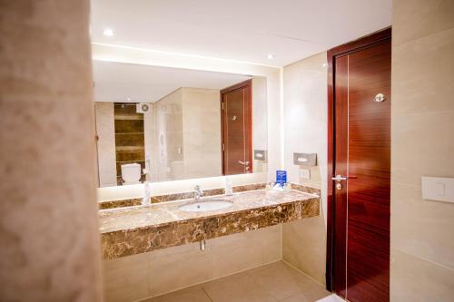 A bathroom at Marina Sharm Hotel
