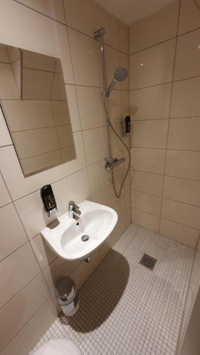 Ένα μπάνιο στο Aparthotel Jonas