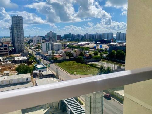 a view of a city from the balcony of a building at Apartamento em Ponta de Campina in Cabedelo