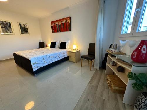 Ένα ή περισσότερα κρεβάτια σε δωμάτιο στο B&B Villa Archez