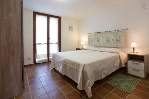 Postel nebo postele na pokoji v ubytování B&B Sa Serra