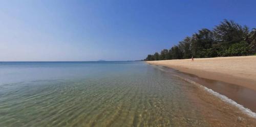 a view of a beach with trees and water at Resort house - 2 min walk to the beach in Ban Krut