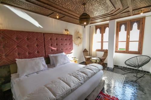 DARIF's Riad & Spaにあるベッド