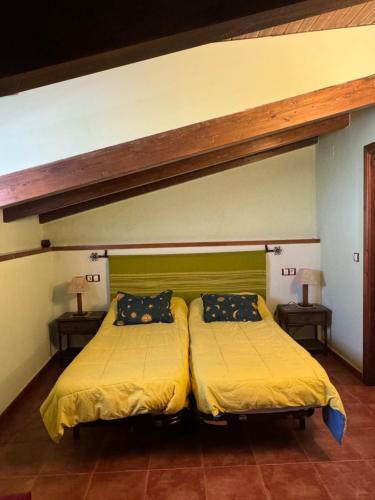 Postel nebo postele na pokoji v ubytování Casa rural María Juliana