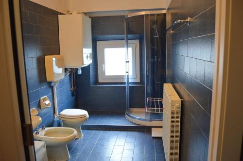 Bathroom sa Palazzetto Scodellari - Roof House