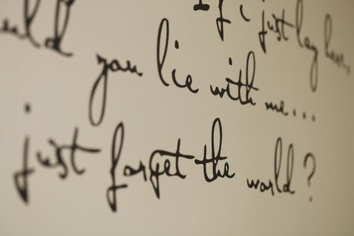 a group of handwriting on a white wall at COSY CAMDEN 2 BEDROOM APARTMENT WITH TERRACE in London
