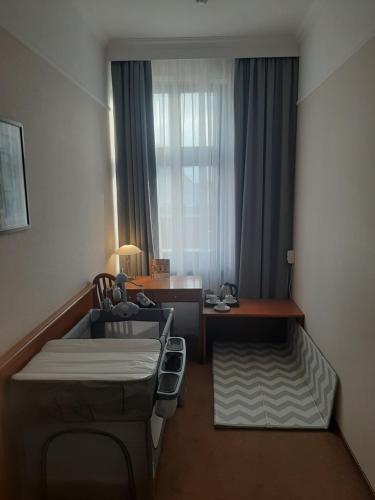 Un ou plusieurs lits dans un hébergement de l'établissement Hotel BAST Wellness & SPA