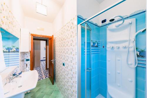 a bathroom with a shower and a sink at Casa Vacanze La Trinità in Ravello