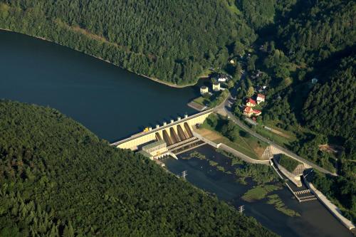 an aerial view of a dam on a lake at Piwnica Rycerska Kęty in Kęty