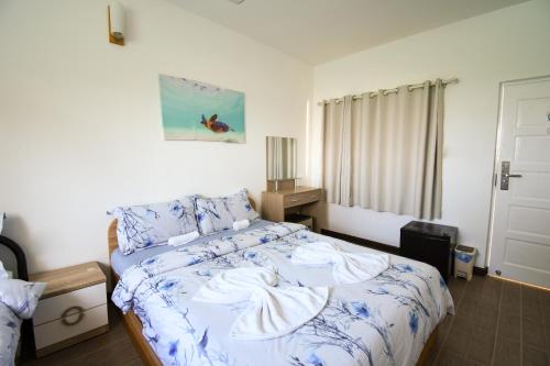 Postel nebo postele na pokoji v ubytování Surf Yoga Camp