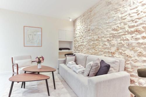 Et opholdsområde på Cozy apartment - 1BR 4P - Grenelle Eiffel tower