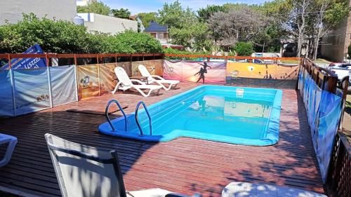 Bazén v ubytování HOTEL Residencial Costa Azul nebo v jeho okolí