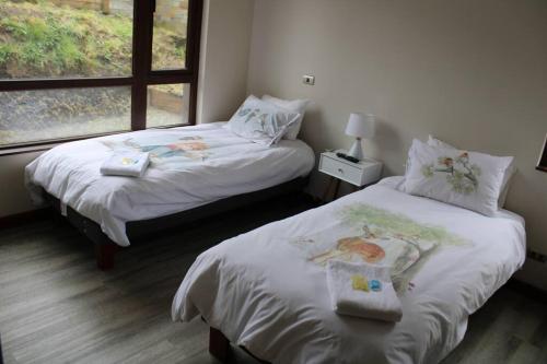 Ένα ή περισσότερα κρεβάτια σε δωμάτιο στο TuarriendoCL-MPHB106 Bello Departamento Puerto Varas