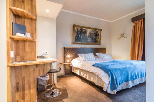 Ένα ή περισσότερα κρεβάτια σε δωμάτιο στο Skultuna Hotell & Konferens