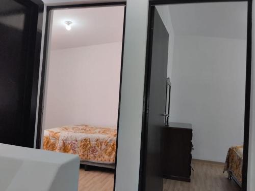 Postel nebo postele na pokoji v ubytování CASA HUAXYACAC