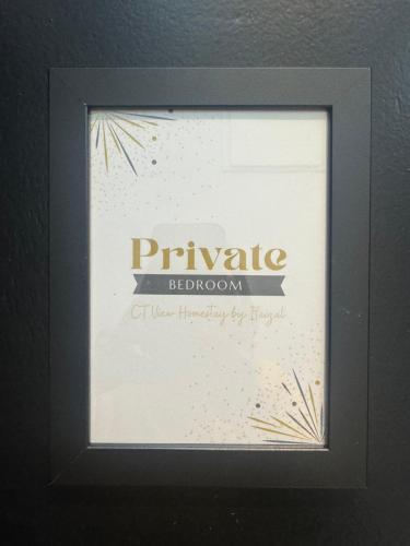 a picture of a sign in a black frame at CT View Homestay by Ifaizal, Presint 15 Putrajaya in Putrajaya