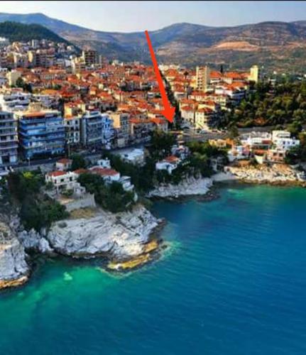 an aerial view of a city next to the water at Margarita's House 2 in Kavála