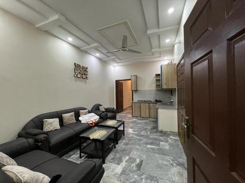 Kuchyň nebo kuchyňský kout v ubytování Signature Suite