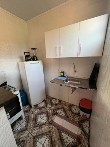 Dapur atau dapur kecil di Chalés da Poliana