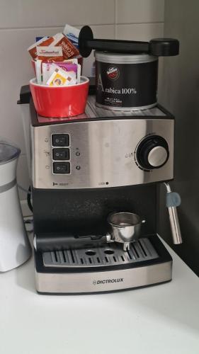 a coffee maker sitting on top of a counter at CASA VACANZA PARADISO in Manfredonia