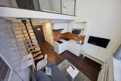 Block 96 Apartmentsにあるテレビまたはエンターテインメントセンター