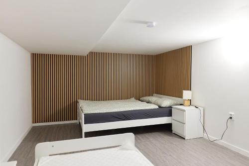 Postel nebo postele na pokoji v ubytování Block 96 Apartments
