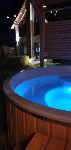 Kolam renang di atau dekat dengan Sjesta al mare, domki z sauną i balią z jacuzzi