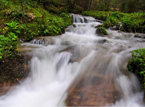 a stream of water rushing down a waterfall at Studio Pablo Vila Bela Reka in Brzeće