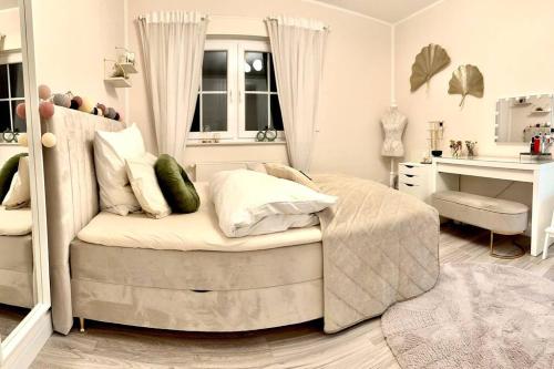 Una cama o camas en una habitación de Private House