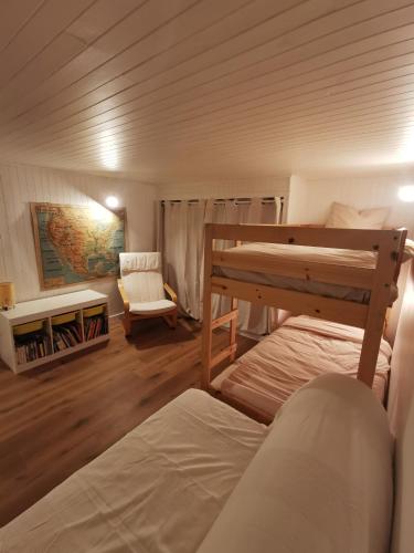 Postel nebo postele na pokoji v ubytování L'Orée, appartement cosy, 4 à 6 pers