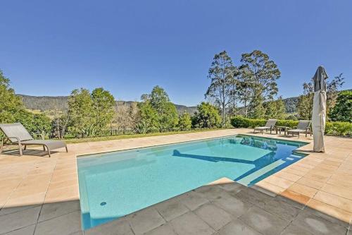 an image of a swimming pool at a house at HighGrove Lodge, Luxury Hunter Valley House with Views, Solar-heated Pool, Space in Millfield