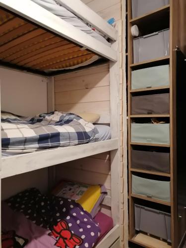 a walk in closet with bunk beds at Appartement 5 personnes en station Savoie Grand Revard in Trévignin