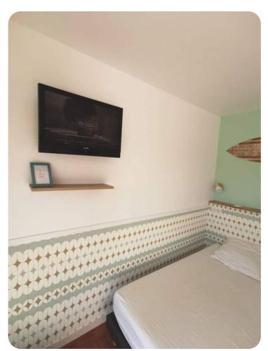 Ένα ή περισσότερα κρεβάτια σε δωμάτιο στο Studio Cosy Biarritz - classé 2 étoiles