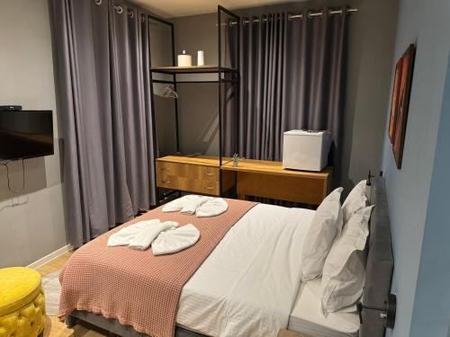Postel nebo postele na pokoji v ubytování Hotel Tirona