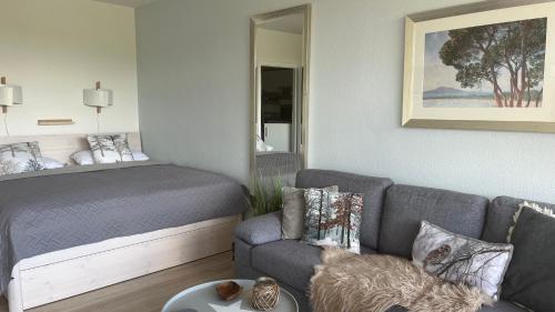 Ένα ή περισσότερα κρεβάτια σε δωμάτιο στο Ferienwohnung Seeblick Hahnenklee