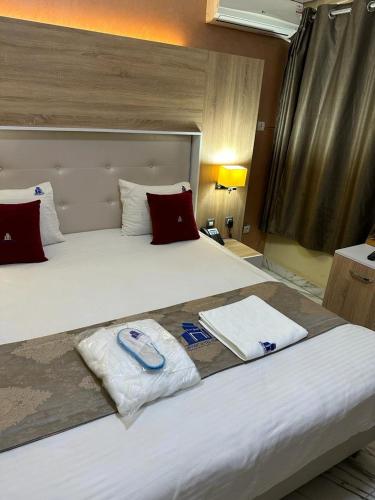 Postel nebo postele na pokoji v ubytování Hôtel Esma Nouadhibou
