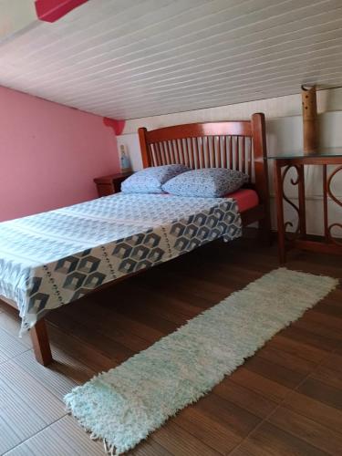 Katil atau katil-katil dalam bilik di Hostel 7 praias