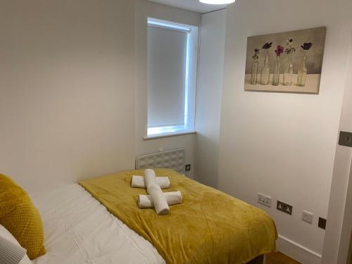 Giường trong phòng chung tại Private Rooms in Euston, Central London (135)