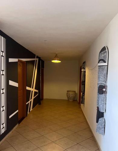 a hallway with skis hanging on the wall at Afiki in Ankwanda