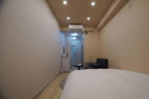 Postel nebo postele na pokoji v ubytování TokyoGuest 浜町