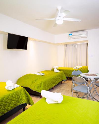 Postel nebo postele na pokoji v ubytování Bambú Hotel