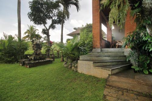 Tegal Sari Accommodation Ubudにある庭