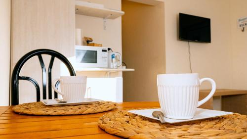 Kuchyň nebo kuchyňský kout v ubytování Bambú Hotel