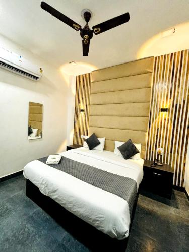 Postel nebo postele na pokoji v ubytování FUSSION HOMESTAY