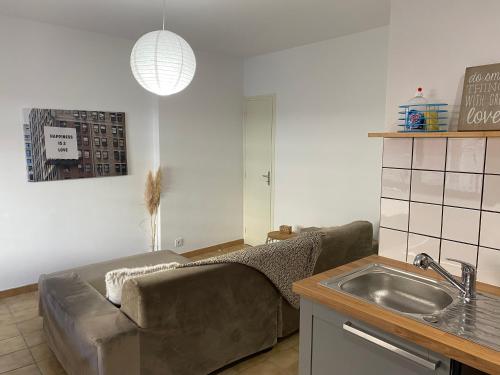 Kuchyň nebo kuchyňský kout v ubytování T2 cosy avec espace extérieur